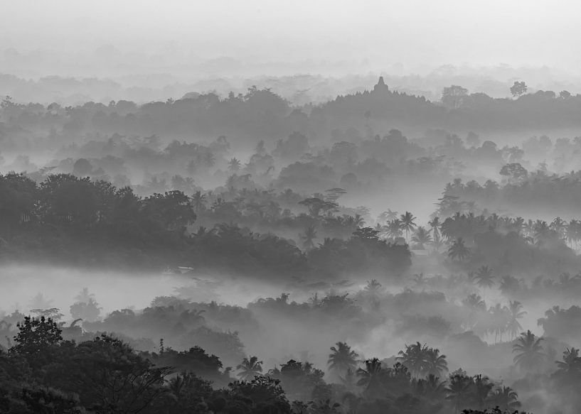Borobudur in the morning mist (black and white edition) by Anges van der Logt