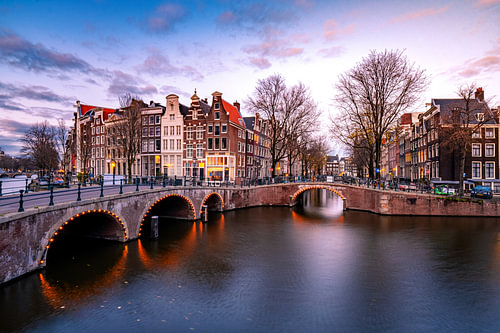 Amsterdam canals Netherlands, Amsterdam Holland during sunset evening during wintertime in the Nethe