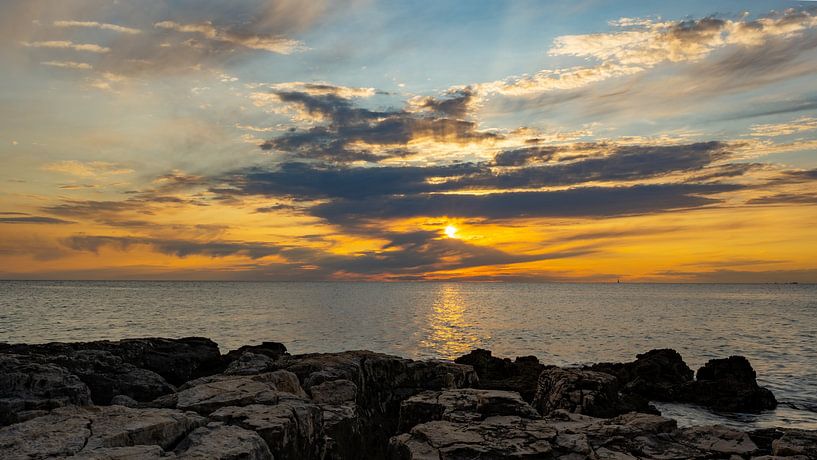 Sunset on the coast of Croatia by Guenter Purin