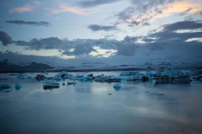 Iceland - Turquoise ice floes moving to the ocean in glacier lagoon by adventure-photos