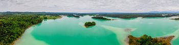 Aerial panorama of the Osterseen with turquoise water and forest