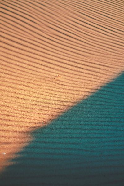 Wind patroon in zand van Andy Troy