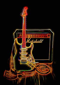 Gitaar en versterker in neonkleuren