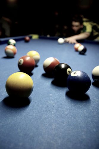 Etwas mit Bällen und einem Stock