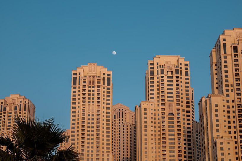 Dubai Marina beach building with Moon by Martijn van den Hil