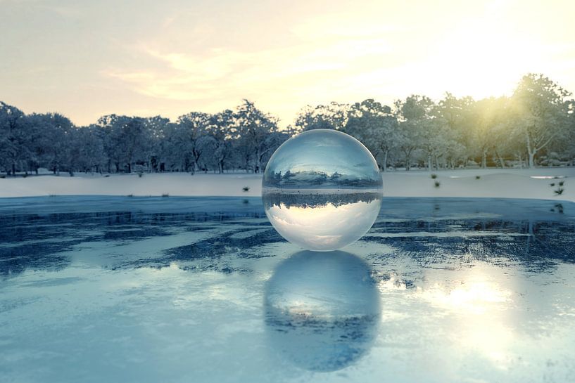 Glass ball on frozen lake by Besa Art