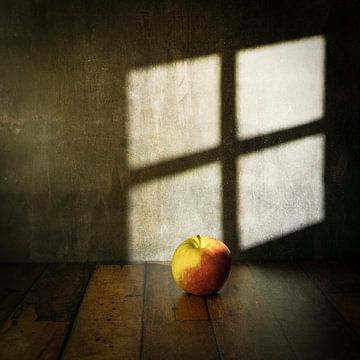 Apple on wooden floor
