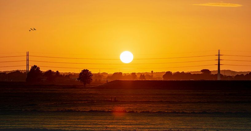 Sunset in the polder by Peter Bartelings
