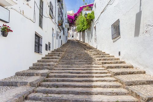 Stairs in a street between white houses in Altea