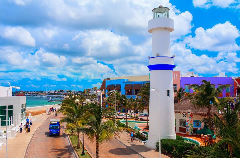 Beautiful quay with white lighthouse by Yevgen Belich