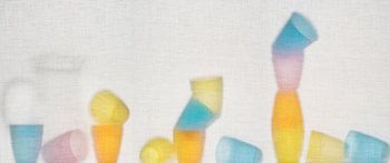 Colorful photo with stacked cups on canvas