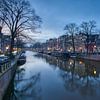 Amsterdamse grachten in het blauwe uurtje van Ad Jekel