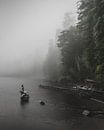 Landscape photo of a foggy misty lake with a statue of a mermaid by Jan Hermsen thumbnail