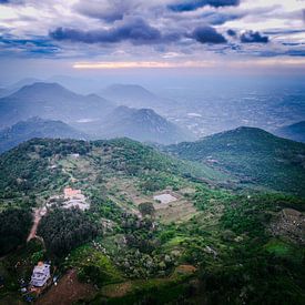 Scenic Mountain Road at Sunset – A Journey into Nature by Madan Raj Rajagopal