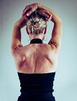 Woman's back,   in color.