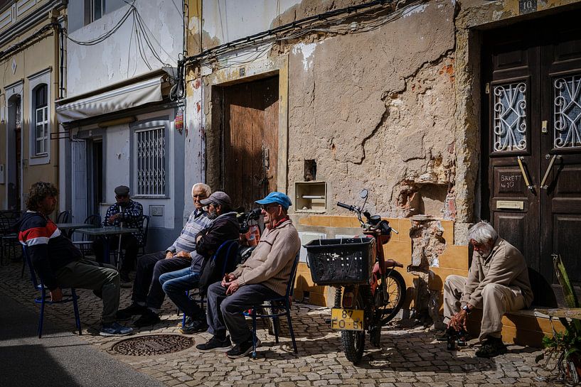 People on the street in Ferragudo by Eddy Westdijk