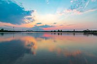 Colourful evening light reflected in the water, shining after sunset