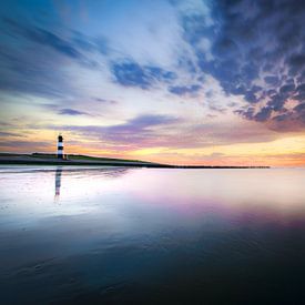 Lighthouse and sunset along the Westerschelde coast between Breskens and Vlissingen by Fotografiecor .nl