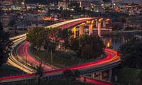 Flowing lights on a bridge in a city