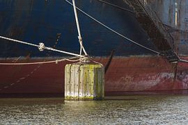Marine vessel moored in the port of Amsterdam by scheepskijkerhavenfotografie