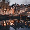 Lumières du canal d'Amsterdam sur Een Wasbeer