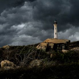 Thunderclouds around the lighthouse of Aruba by Ronald Huijben