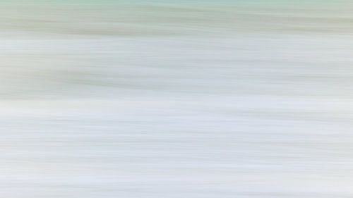 Tranquility. Soft hues of the North Sea waves in the winter morning light. Aspect ratio 16:9