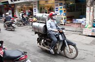 The means of transport in Asia is the moped. von Arie Storm Miniaturansicht