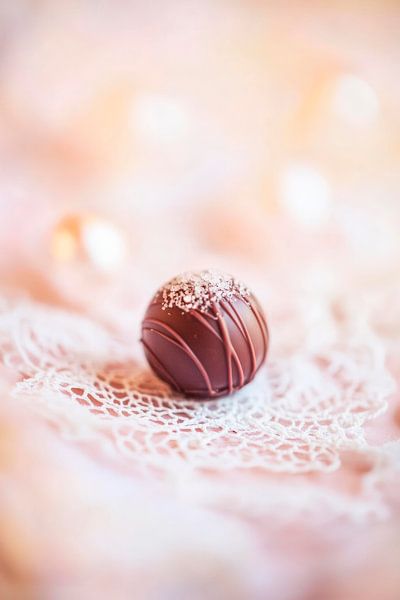 Chocolate truffles on lace by Poster Art Shop