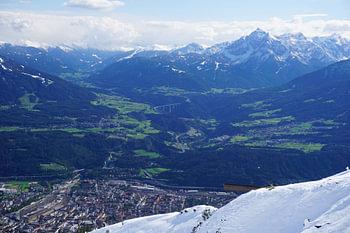 Snow in summer with a view on Innsbruck and the Serles, Tyrol (Austria)