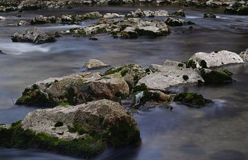Stones in water van Ulrike Leone