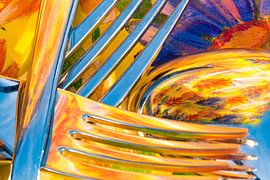 Fork and spoon against a colourful background by Hans-Jürgen Janda