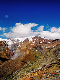 High Alpine Trail with Snowy Peaks and Cevedale Guido Larcher Hut in the Italian Mountains by Strange Paradise