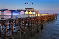 Evening light at the Pier by the sea in Hastings England