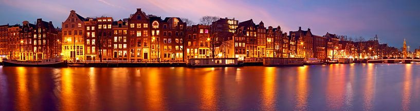 Panorama of Amsterdam on the Amstel river with the Munttoren in the Netherlands at sunset by Eye on You
