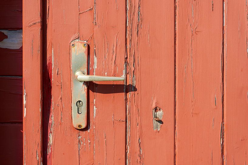 Old wooden door to a dilapidated garden shed by Heiko Kueverling