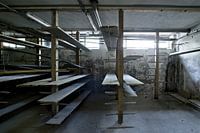 Picture of the cheese boards in an old dairy.