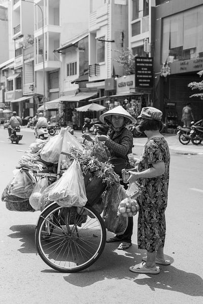 Selling on a bicycle by Bart van Lier