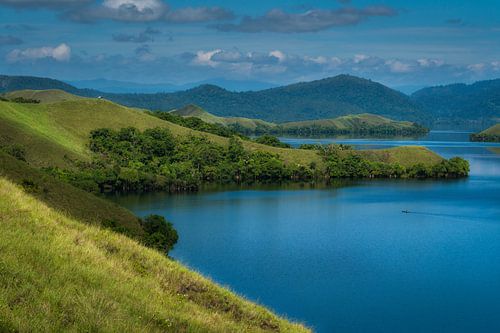 One of the views of Lake Sentani in Papua by Anges van der Logt