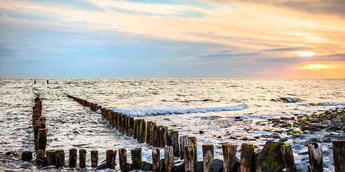 Zonsondergang aan zee