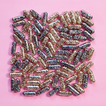 Vitamin G - Glitter-Pillen - rosa Hintergrund