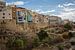 Huizen in dal van dorp Joiosa in Alicante, Spanje van Joost Adriaanse