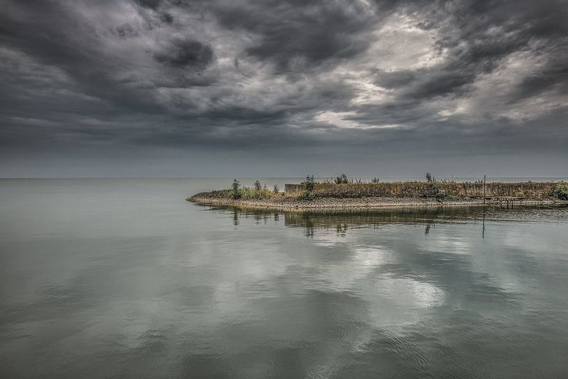The pier of the small harbour of Laaxum in Friesland by Harrie Muis