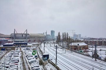 Train tracks covered in snow by Jasper Scheffers