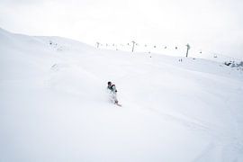 Freeriding powder snow riding in Montafon, Vorarlberg Snowboard group