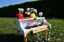 Fubby's on piano making music and dancing. by Sailographic Paula