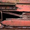 closeup van een trein wagon met een slot en een verrot hout van W J Kok