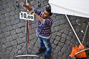 Vendeur sur le marché de Rome
