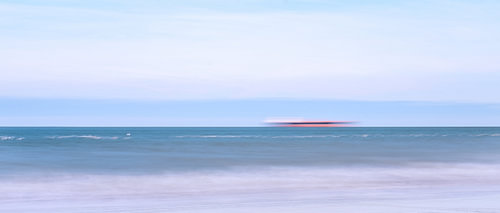 blurry sea with boat
