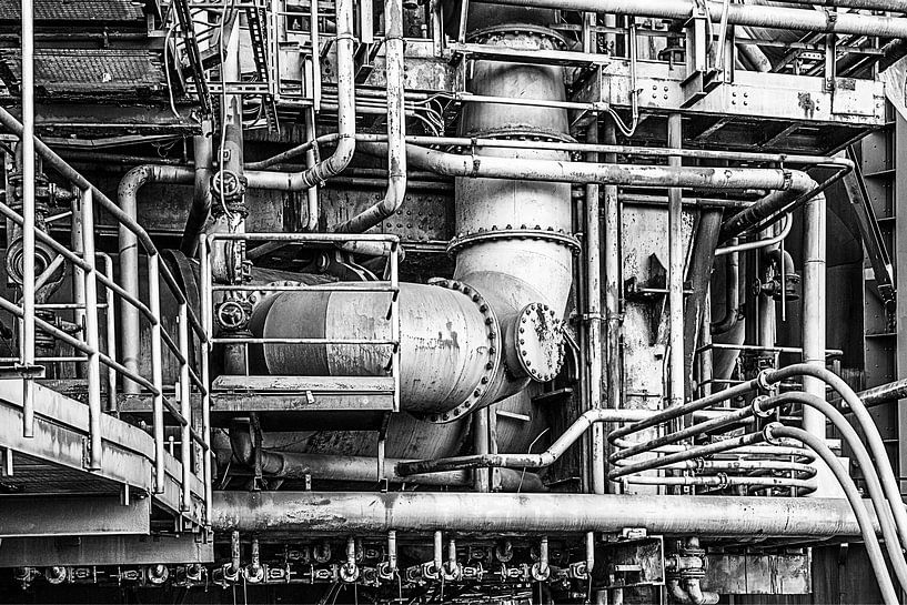 Close up of a blast furnace factory with tubes and pipes by Elles Rijsdijk
